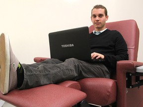 Queen's University graduate student Mitch Wilson is running a study to determine if the time we spend sitting can offset the benefits of physical activities and is looking for volunteers from the community. (Michael Lea The Whig-Standard)