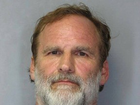 Dr. Melvin Morse, 58, is seen in this booking photo released by the Delaware State Police August 9, 2012. (REUTERS/Delaware State Police/Handout)