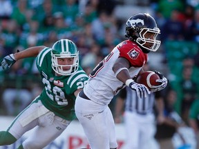 Former Roughrider Craig Butler (left) will now be hunting down the opposition as a member of the Hamilton Tiger-Cats. (REUTERS/FILES)