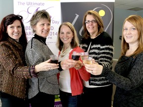 Maureen Geddes, left, Sandra Maltby-Mills, Lisa Fox Bail, Maralee Noltie and Kathy Vandermey toast the launch of the second annual Ultimate Me Day women's conference on March 29 at the John D. Bradley Convention Centre in Chatham.