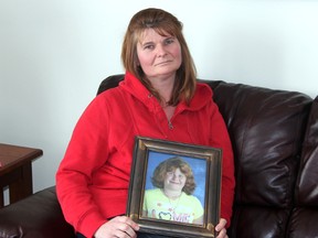 Diane Keck poses with a photo of her daughter Jillian. Jillian, 10, was killed in a car accident at the corner of Cathcart and Murphy road early in 2013. With changes to driving eligibility regulations coming this April, Diane Keck wants answers as to why. SHAUN BISSON/THE OBSERVER/ QMI AGENCY