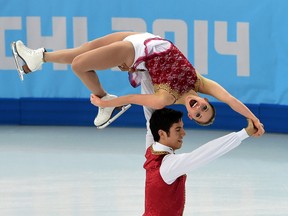 Paige Lawrence and Rudi Swiegers during the pairs free skate at the 2014 Winter Games in Sochi, Russia, Feb. 12, 2014. (BEN PELOSSE/QMI Agency)
