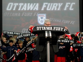 Ottawa Fury Soccer Club Owner and CEO, and OSEG partner, John Pugh speaks at a press conference on February 26,2013. Errol McGihon/The Ottawa Sun/QMI Agency