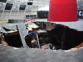 National Corvette Museum photo shows a sink hole that swallowed eight Corvettes in Bowling Green, Kentucky in this image released to Reuters on February 12, 2014.   REUTERS/National Corvette Museum/Handout