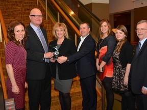 Elgin county received two marketing awards from the Economic Developers Council of Ontario at a recent ceremony in Toronto. Pictured are Kathryn Russell, left, Elgin tourism coordinator; Alan Smith, general manager of economic development; Jennifer Patterson, EDCO past president; Mark McDonald, Elgin county CAO; Jessica Nesbitt, economic development assistant; Katherine Thompson, marketing and communications coordinator; and David Marr, Elgin county warden. (Submitted photo)
