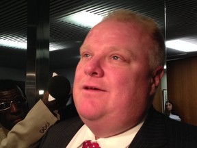 Rob Ford speaks to reporters at City Hall on Thursday. (DON PEAT/Toronto Sun)