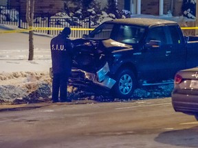 An 18-year-old woman is dead, and the province's Special Investigations Unit is investigating, after the woman was struck and killed by a police vehicle on St. Clair Ave., west of Warden Ave., shortly after 8:15 p.m. Wednesday. (VICTOR BIRO/Special to the Toronto Sun)