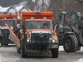 Snow clearing equipment makes its way up North Street Thursday morning as they removed snowbanks from the side of the road.
Michael Lea The Whig-Standard