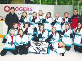 The U12 Portage Thunder celebrate their tournament win in Selkirk last week. (Submitted photo)