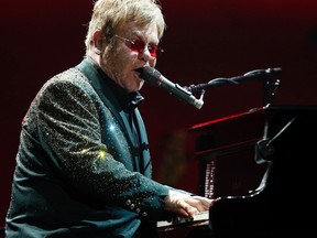 Elton John rocks the Canadian Tire Centre in Ottawa, Ont. on Thursday February 13, 2014. Darren Brown/Ottawa Sun/QMI Agency