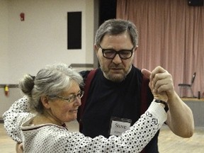 Steve Natran leads June Crowther while the two demonstrate for the rest of the class just prior to their most recent ballroom dancing lesson at the Stony Plain Community Centre on Friday, Feb. 7. - Thomas Miller, Reporter/Examiner