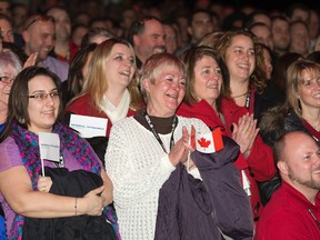 General Dynamics Land Systems employees in London had plenty to smile about Friday. (DEREK RUTTAN, The London Free Press)