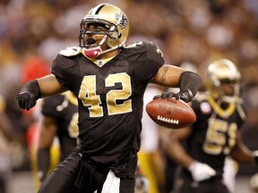 New Orleans Saints cornerback Darren Sharper celebrates after recovering a fumble during NFL football action in New Orleans October 31, 2010. (REUTERS/Sean Gardner)