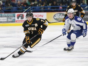 Sarnia Sting defenceman Anthony DeAngelo (in black) has been suspended for eight games by the Ontario Hockey League for violating the League's Harassment and Abuse/Diversity Policy. OBSERVER FILE PHOTO
