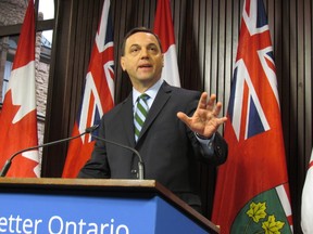 Ontario PC Leader Tim Hudak talks to media on Friday February 14 2014 about the meaning of two Ontario byelections. (Toronto Sun/Antonella Artuso)