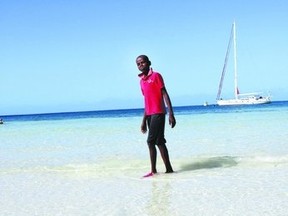 Local boy, Anderson, takes a shortcut through the shallows at Paradise Cove. (STEVE MACNAULL, Special to QMI Agency)