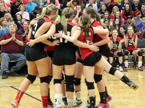 The Northern Vikings senior girls volleyball team celebrates a point in the first set of the LSSAA championship game on Friday night. The Vikings defeated the St. Patrick's Fighting Irish in straight sets by scores of 25-23, 25-17, and 27-25. (SHAUN BISSON, The Observer)