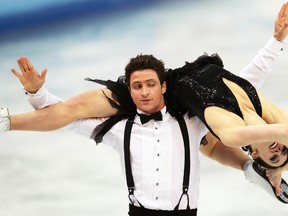 Canadian figure skaters Tessa Virtue and Scott Moir compete in the team ice dance short dance program at the 2014 Winter Games in Sochi, Russia, Feb. 8, 2014. (AL CHAREST/QMI Agency)