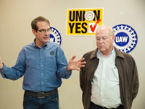 United Auto Workers President Bob King (L) and Secretary-Treasurer Dennis Williams answer questions during a news conference at the Chattanooga Electrical Apprenticeship and Training Center after the announcement that the union lost its bid to represent the 1,550 blue-collar workers at the Volkswagen plant in Chattanooga, Tennessee, February 14, 2014. REUTERS/Christopher Aluka Berry