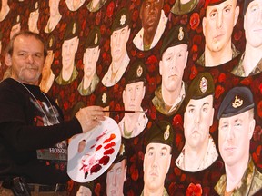 Artist Dave Sopha has spent six years painting his massive mural, Portraits of Honour, which pays tribute to the 158 Canadian soldiers killed in Afghanistan. (Chris Doucette/Toronto Sun)