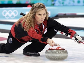 Canada's skip Jennifer Jones delivers a stone during their women's curling round robin-game against South Korea at the Ice Cube Curling Center during the 2014 Sochi Winter Olympic Games Feb. 17, 2014. (INTS KALNINS/Reuters)