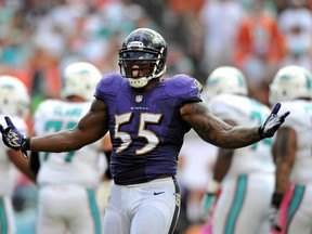 Baltimore Ravens linebacker Terrell Suggs reacts after sacking Miami Dolphins quarterback Ryan Tannehill during the second half at Sun Life Stadium Oct. 6, 2013. (Steve Mitchell/USA TODAY Sports)