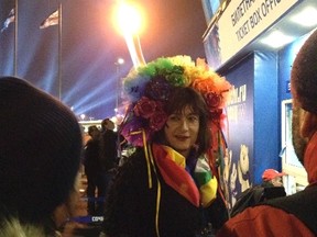 Transgender Vladimir Luxuria obtains a ticket before she was detained for the second time as she attempted to enter a women's ice hockey match in Shayba Arena at the 2014 Sochi Winter Olympics, February 17, 2014. (REUTERS)