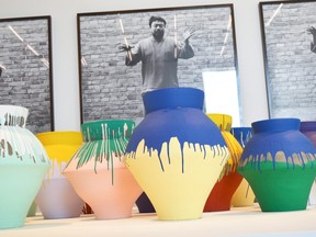 Chinese artist Ai Weiwei's "Colored Vases" are shown at the Perez Art Museum Miami, Fla., in this December 3, 2013 photo. (REUTERS/Zachary Fagenson)