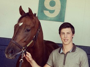 Ryan Nugent-Hopkins poses with Zenya, the thoroughbred race horse he purchased a couple of years ago. (Supplied)