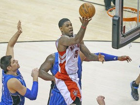 Raptors forward Amir Johnson was going “full speed” at practice after sitting for two games. (USA TODAY SPORTS)