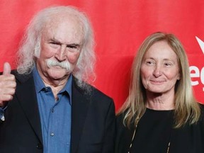 Singer David Crosby (L) and wife Jan Dance pose at the 2014 MusiCares Person of the Year gala honoring Carole King in Los Angeles, January 24, 2014. REUTERS/Danny Moloshok
