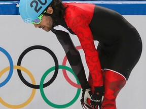 Canada's Charles Hamelin reacts after crashing out in the men's 500 metres short track heat event at the Iceberg Skating Palace during the 2014 Sochi Winter Olympics February 18, 2014.  (REUTERS)