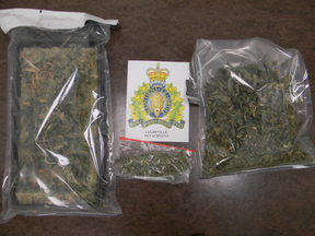 Bags of marijuana, seedling plants and growing supplies were seized when police, after responding to a domestic dispute call, searched a barn near Mundare. (RCMP Handout photo)