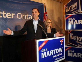 Ontario PC leader Tim Hudak with Gila Martow as they arrive at her campaign party after winning the Ontario byelection in the Thornhill riding on Thursday Feb. 13.
 Michael Peake/Toronto Sun/QMI Agency