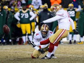 San Francisco 49ers kicker Phil Dawson (9) boots the game-winning field goal against the Green Bay Packers during the 2013 NFC wild card game at Lambeau Field. (Mike DiNovo/USA TODAY Sports)