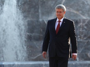 Canadian Prime Minister Stephen Harper leaves the Ninos Heroes monument at Chapultepec Park in Mexico City February 17, 2014.  REUTERS/Tomas Bravo