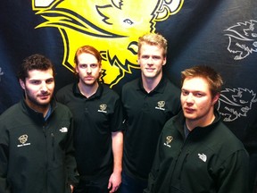 (Left to right) Joe Caligiuri, Ian Duval, Dane Crowley and Darren Bestland are four graduating members of the University of Manitoba Bisons men's hockey team that will host the Mount Royal Cougars of Calgary in Canada West best-of-three quarter-final playoff action, Feb. 21, 22 and 23 at Wayne Fleming Arena in Winnipeg.
KIRK PENTON/Winnipeg Sun/QMI Agency