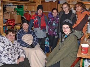 CHRIS ABBOTT/TILLSONBURG NEWS

A group of teens, mainly members of the Leo Club of St. Marys, raised nearly $700 for playground equipment in Eastmain, James Bay, with an overnight 'camp' in an outdoor shed in Tillsonburg on the weekend.