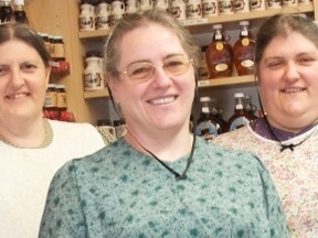 Lydia Weber, left, her sister Almeda Weber, right, and their friend Nancy Shantz decided to share their homemade summer sausage in 1989 — so the trio launched Kitchen Kuttings.