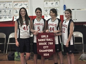 Shayne Nichols, Erica Lavallee, Justice Bryson, and Cassidy Elliott of the LVS Voyageurs during LVS' 28-17 win in the Portage la Prairie Middle School Girls' Basketball final Feb. 19. (Kevin Hirschfield/THE GRAPHIC/QMI AGENCY)