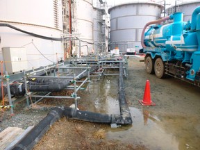 Highly contaminated water, which leaked from a large storage tank, is seen at the H6 area of the contaminated water storage tanks, at Tokyo Electric Power Co. (TEPCO)'s tsunami-crippled Fukushima Daiichi nuclear power plant in Fukushima prefecture in this February 20, 2014 handout photo released by TEPCO. (REUTERS/Tokyo Electric Power Co/Handout via Reuters)