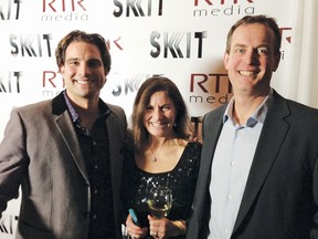 Paul Bremner (right) and his wife Louise Daw enjoy some festive fun with Scott MCGillivray, host of Income Property of HGTV.