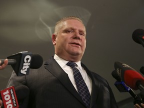 Councillor Doug Ford hold a press conference to announce that does not plan to run in a potential provincial election this year. (VERONICA HENRI/Toronto Sun)