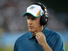 Miami Dolphins head coach Joe Philbin looks on during the first quarter of the NFL Hall of Fame Game against the Dallas Cowboys in Canton, Ohio August 4, 2013. (REUTERS/Aaron Josefczk)