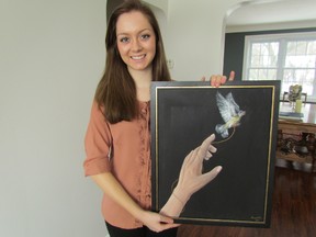 Sarnia's Emma McCann, 16, was recently named one of 12 winners of the 2012 Ontario Junior Citizens awards given by the Ontario Community Newspapers Association. McCann became an advocate for mental health issues after raising more than $6,000 for the Sarnia-Lambton Suicide Prevention Committee by selling prints of her painting The Ties that Bind. Sarnia, Ont., Jan. 28, 2013 PAUL MORDEN/THE OBSERVER/QMI AGENCY