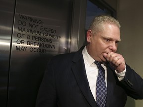 Councillor Doug Ford holds a press conference on Thursday February 20, 2014 at City Hall in Toronto. (Veronica Henri/Toronto Sun)