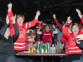 Over 40 Jayna Hefford supporters gathered at Jakk Tuesdays Sports Bar Thursday afternoon to watch the nail-bitting gold medal win of Team Canada's women's hockey team against the United States at the Winter Olympics in Sochi, Russia. 
JULIA MCKAY/KINGSTON WHIG-STANDARD/QMI AGENCY