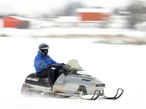 Snowmobiling. (CLIFFORD SKARSTEDT/QMI Agency)