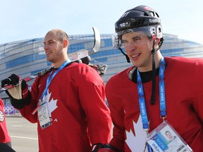 Team Canada's Ryan Getzlaf and Sidney Crosby walk back to the Bolshoy Ice Dome after hockey practice during the 2014 Olympic Winter Games in Sochi, Russia, on Thursday February 20, 2014. (Al Charest/QMI Agency)