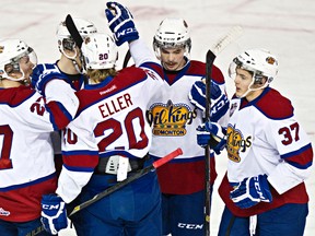 The Oil Kings celebrate Dysin Mayo's (far right, 37) goal during the Edmonton Oil Kings' WHL hockey game against the Red Deer Rebels at Rexall Place in Edmonton, Alta., on Friday, Feb. 14, 2014. Codie McLachlan/Edmonton Sun/QMI Agency